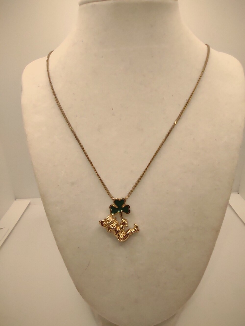 Gold Four-Leaf Clover and Lucky Charm Necklace - Green Accent